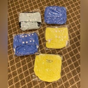 5 Rain Forest babies reusable diapers size small. NWT